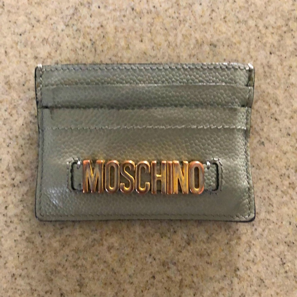 Moschino leather card holder. Holds atleast 6 cards. Gray